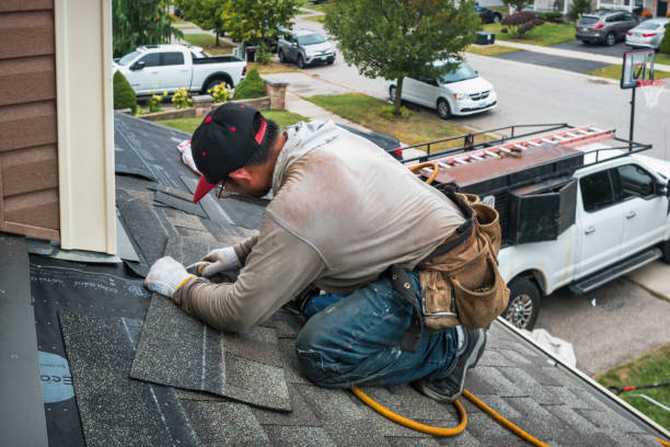 Professional Roofing technician working in Tow, TX